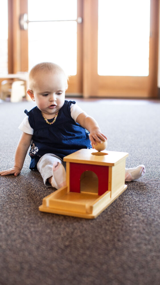 infant playing.